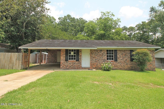 127 Woodland Dr, Lucedale, MS 39452 - ranch-style home with driveway, a carport, and brick siding