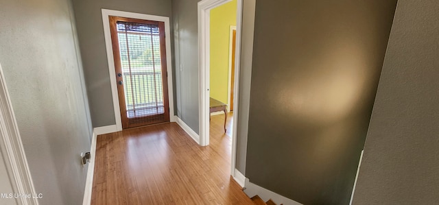 doorway to outside featuring light hardwood / wood-style floors