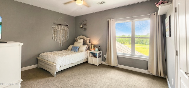 bedroom featuring ceiling fan and light carpet