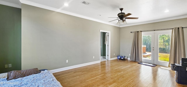 interior space featuring ceiling fan, ornamental molding, and access to outside