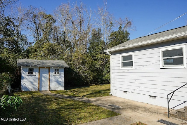 exterior space with a storage shed