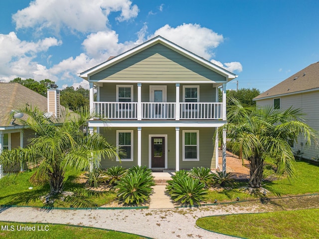 view of front of house with a balcony and a porch