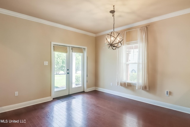 entryway featuring crown molding, a notable chandelier, french doors, and dark hardwood / wood-style flooring