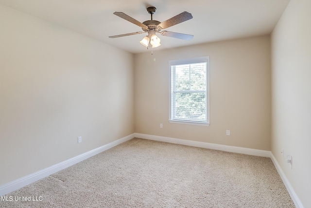 carpeted empty room with ceiling fan