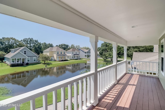 deck featuring a water view