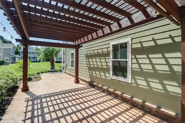 view of patio featuring a pergola