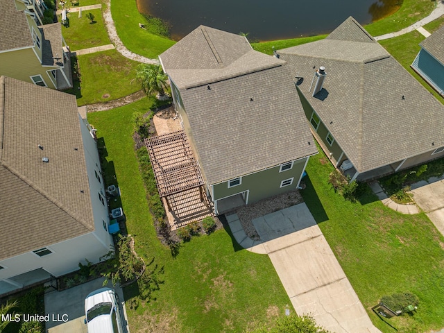 bird's eye view with a water view