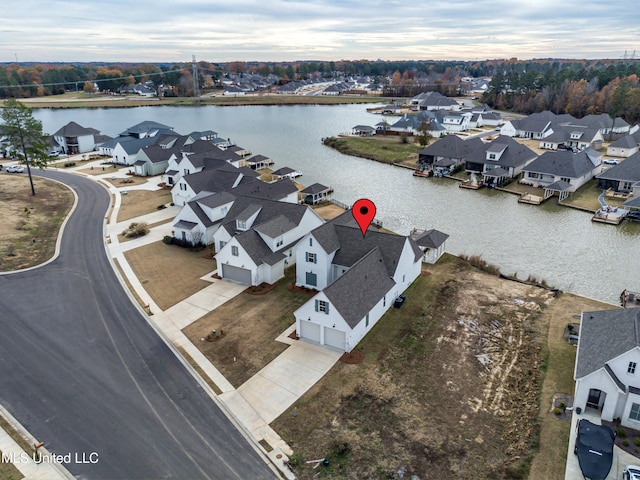 drone / aerial view featuring a water view