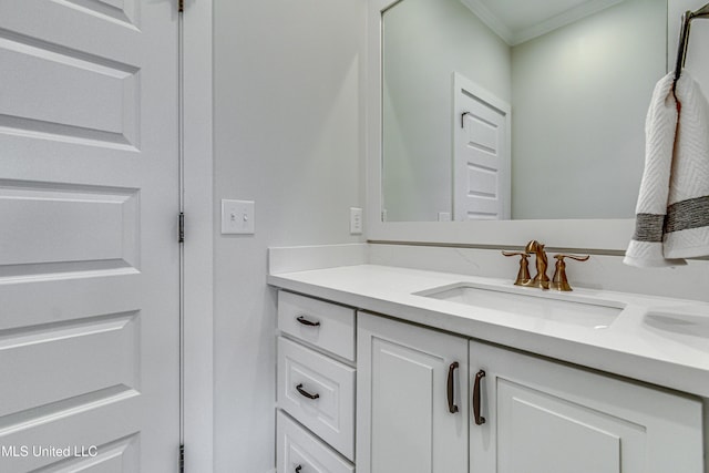 bathroom featuring vanity and crown molding