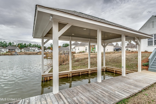 dock area featuring a water view