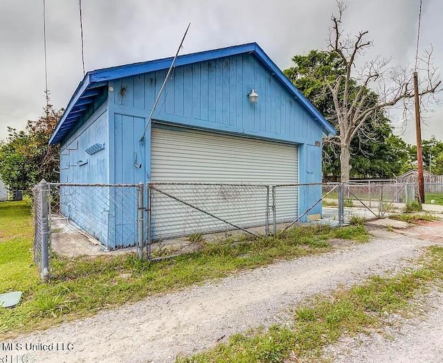 view of outbuilding featuring a garage