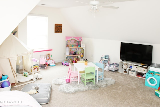 playroom with vaulted ceiling, carpet floors, and ceiling fan