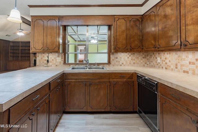 504 Hampton St, Clinton, MS 39056 - kitchen with dishwasher, a sink, ceiling fan, tasteful backsplash, and a peninsula