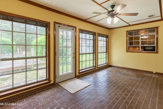 504 Hampton St, Clinton, MS 39056 - doorway with brick flooring, baseboards, ornamental molding, and a ceiling fan