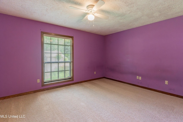 504 Hampton St, Clinton, MS 39056 - carpeted empty room featuring a textured ceiling, ceiling fan, and baseboards
