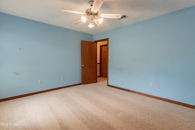 504 Hampton St, Clinton, MS 39056 - carpeted spare room featuring ceiling fan and baseboards