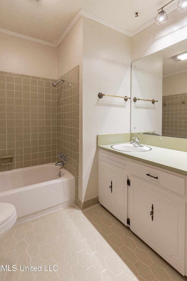 504 Hampton St, Clinton, MS 39056 - full bathroom with crown molding, tile patterned flooring, washtub / shower combination, toilet, and vanity