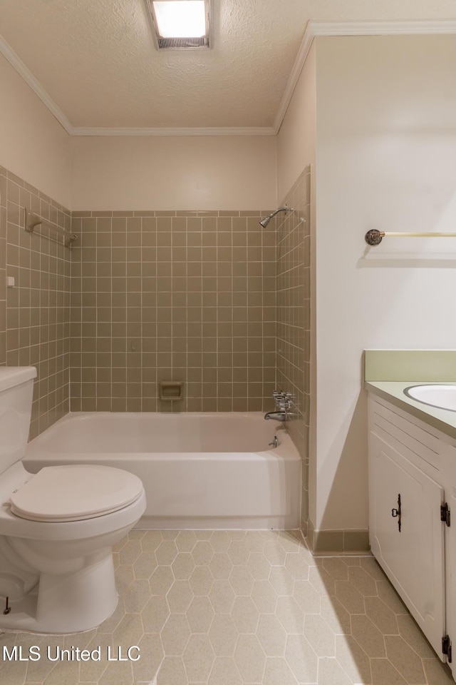 504 Hampton St, Clinton, MS 39056 - bathroom featuring toilet, tile patterned flooring, a textured ceiling, crown molding, and shower / tub combination