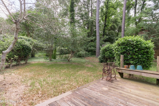 504 Hampton St, Clinton, MS 39056 - wooden terrace featuring a yard