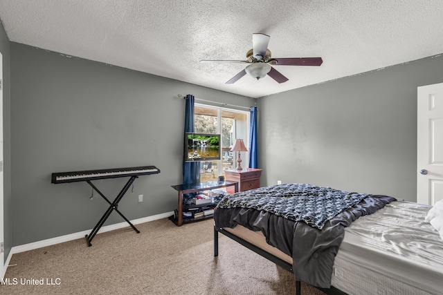 257 Highpoint Dr Unit 257, Diamondhead, MS 39525 - bedroom with carpet, a textured ceiling, and a ceiling fan
