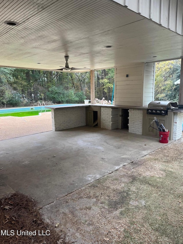 view of patio / terrace featuring ceiling fan, a grill, and area for grilling