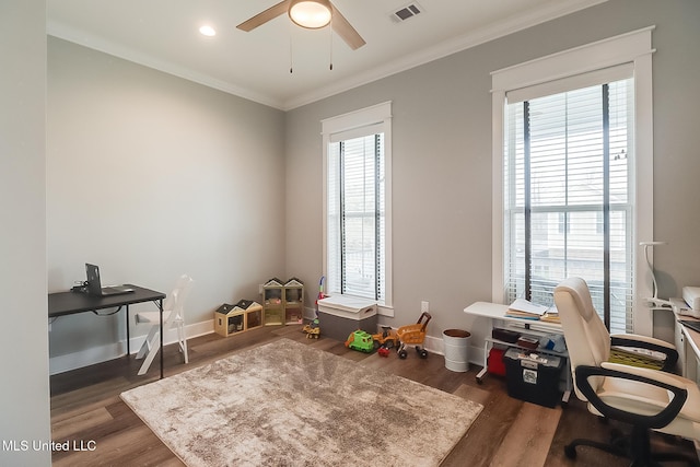 home office with ceiling fan, ornamental molding, and dark hardwood / wood-style floors