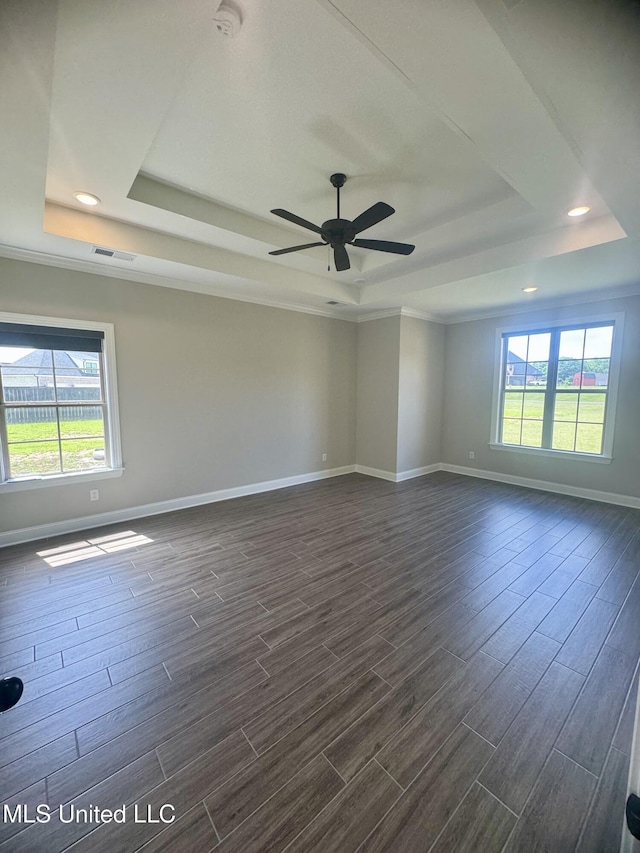 5322 Grays Valley Dr, Hernando, MS 38632 - empty room with a tray ceiling, dark wood-style flooring, a smoke detector, ceiling fan, and recessed lighting