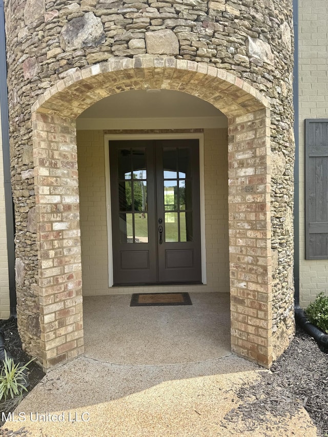 5322 Grays Valley Dr, Hernando, MS 38632 - property entrance featuring french doors and brick siding