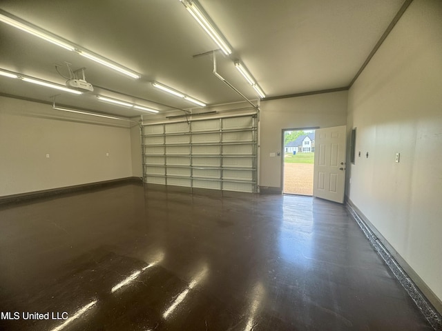 5322 Grays Valley Dr, Hernando, MS 38632 - garage with a garage door opener and baseboards