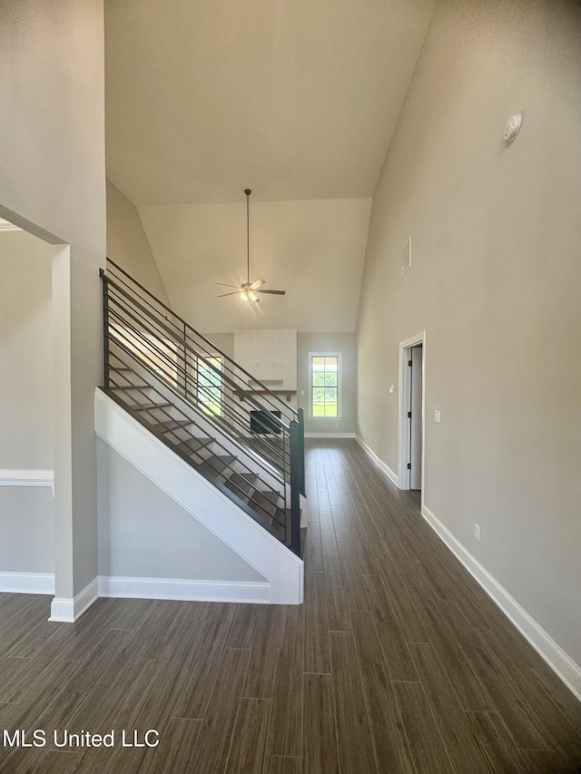 5322 Grays Valley Dr, Hernando, MS 38632 - stairs featuring high vaulted ceiling, wood finished floors, and a ceiling fan