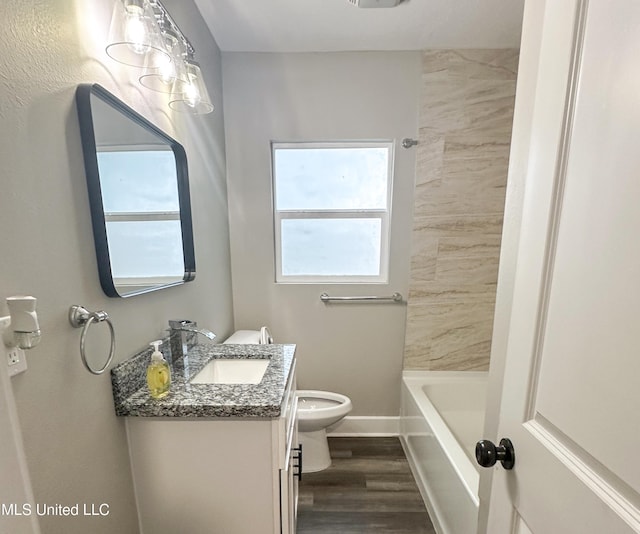 1630 Hollywood Blvd, Biloxi, MS 39531 - full bathroom featuring vanity, wood finished floors, and shower / bathtub combination