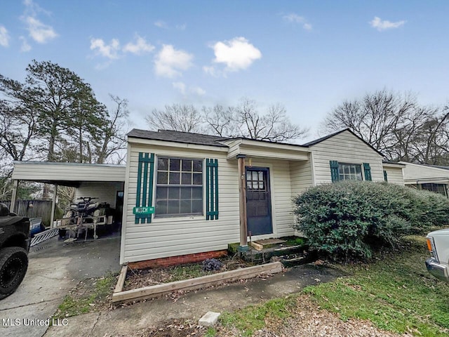 view of front of house with a carport