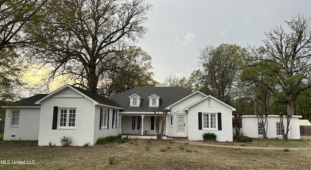 341 N Ruby Ave, Ruleville, MS 38771 - view of front facade featuring covered porch and brick siding