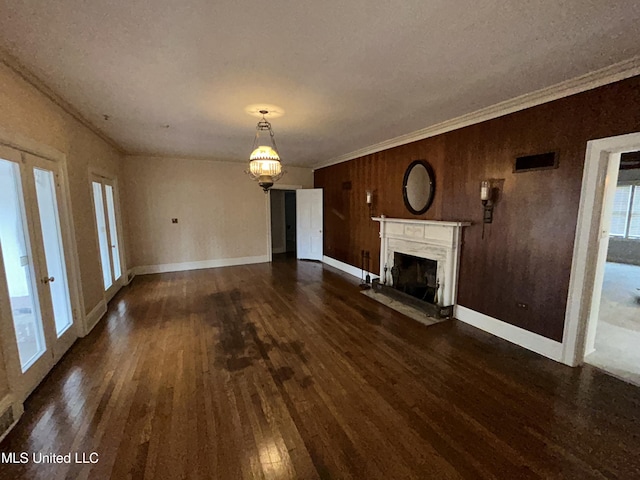341 N Ruby Ave, Ruleville, MS 38771 - unfurnished living room with crown molding, a premium fireplace, baseboards, a textured ceiling, and wood finished floors