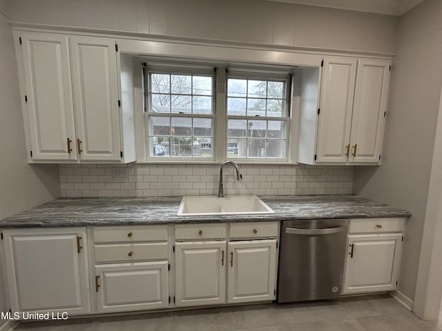 341 N Ruby Ave, Ruleville, MS 38771 - kitchen featuring white cabinetry, a sink, tasteful backsplash, and dishwasher