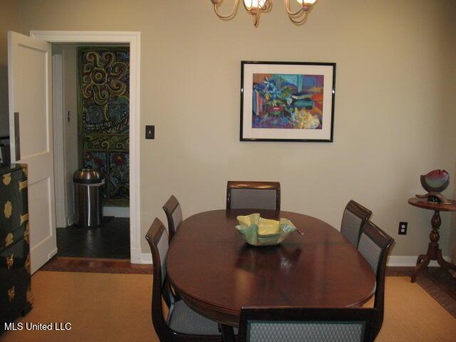 dining area with a chandelier