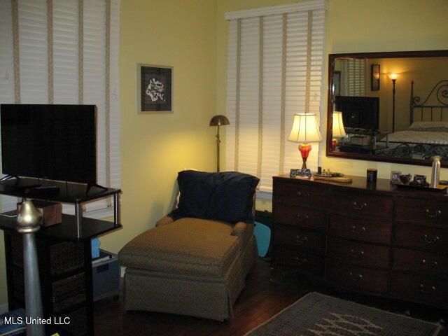 sitting room with hardwood / wood-style floors