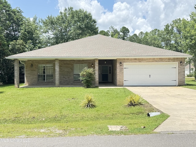 730 Ieke Cir, Diamondhead, MS 39525 - single story home featuring an attached garage, driveway, a front yard, and brick siding