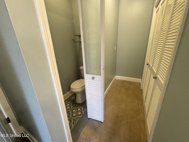 730 Ieke Cir, Diamondhead, MS 39525 - bathroom with toilet and baseboards