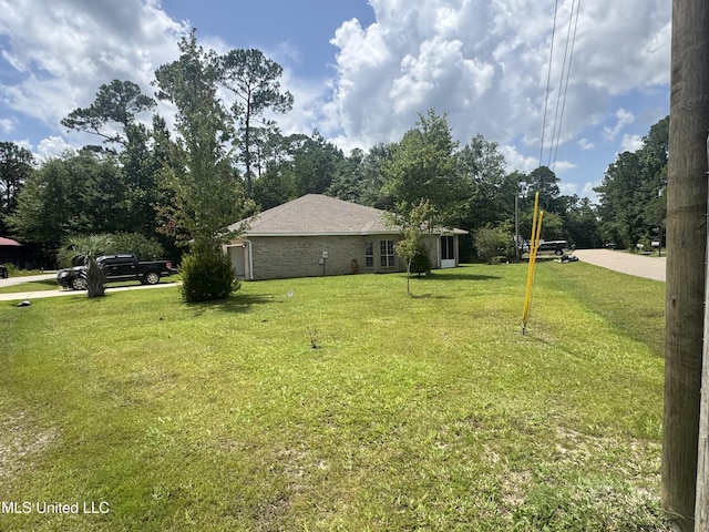 730 Ieke Cir, Diamondhead, MS 39525 - view of grassy yard