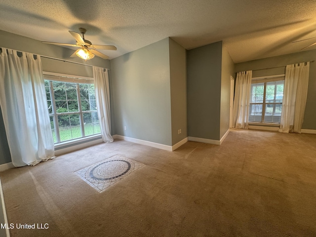 730 Ieke Cir, Diamondhead, MS 39525 - carpeted spare room featuring ceiling fan and a textured ceiling