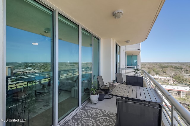 balcony featuring a sunroom