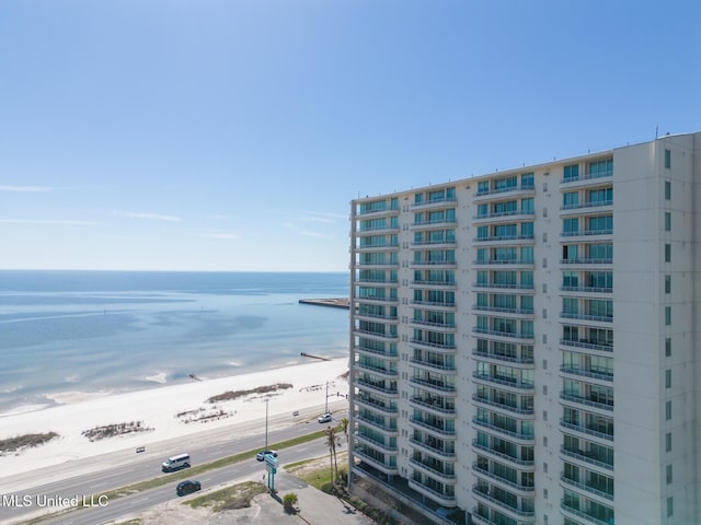 view of water feature with a beach view