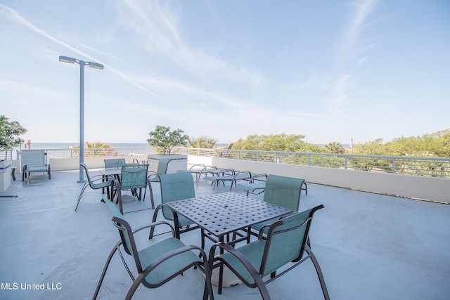 view of patio featuring outdoor dining area