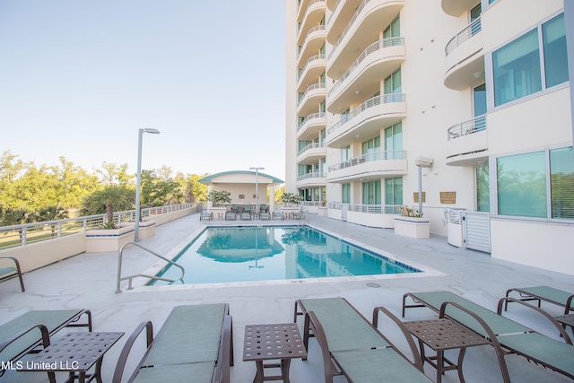 pool featuring a patio