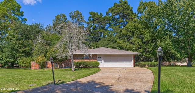 ranch-style house featuring a garage, concrete driveway, a front lawn, and brick siding