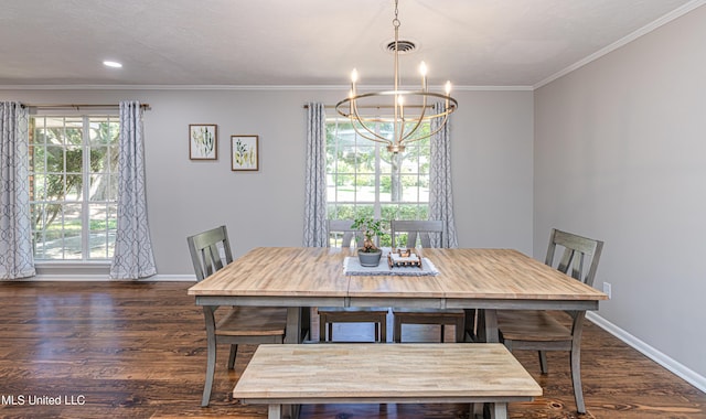 dining space with visible vents, baseboards, and wood finished floors