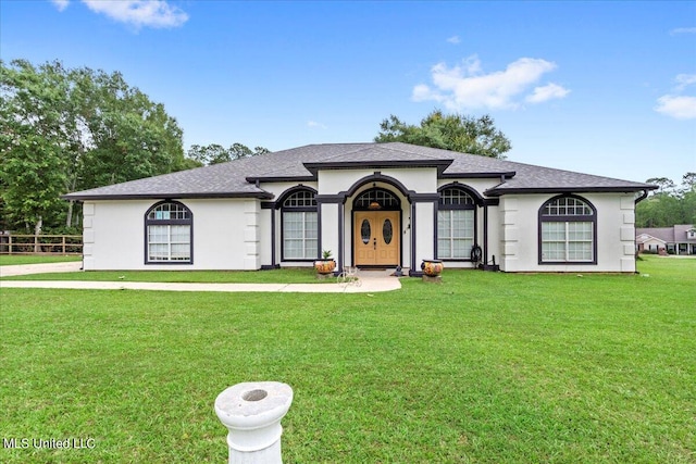 view of front of property with a front lawn