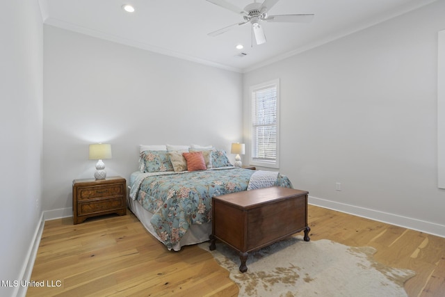 bedroom with recessed lighting, baseboards, light wood-style flooring, and crown molding