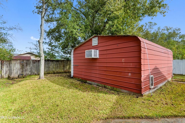 view of outdoor structure featuring a yard